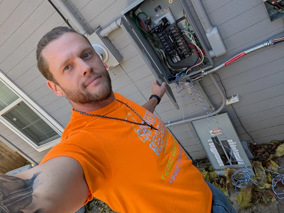 Walter Shepherd working on a residential electrical panel